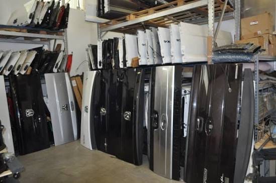 Tailgates stored indoors on the rack